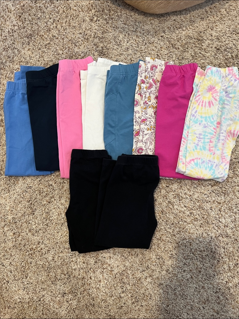 Pack of Girls' size 8 leggings and capris